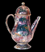 Toy coffee pot approximately 5 1/4 inches tall with pink and copper luster on white-bodied ware.
